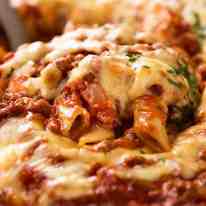Close up of serving Baked Ziti fresh out of the oven