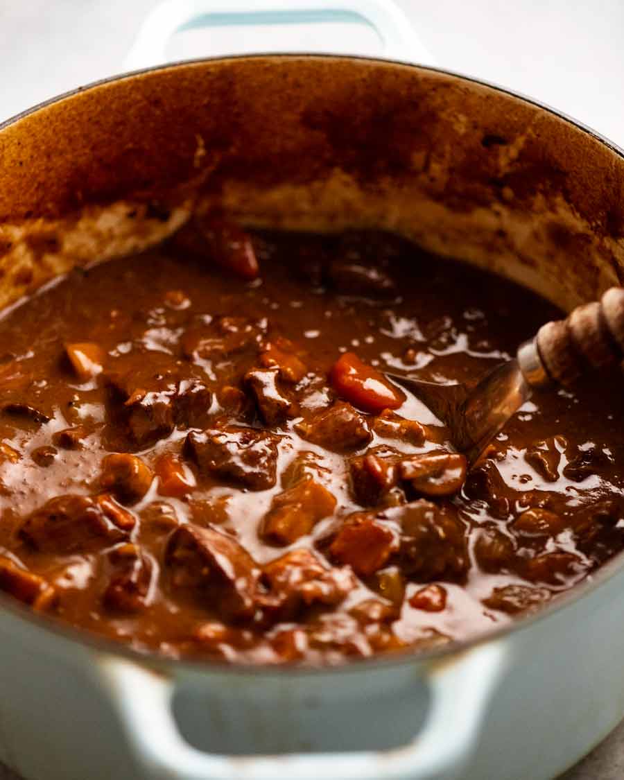 Close up of pot of slow cooked beef filling for Family Meat Pie
