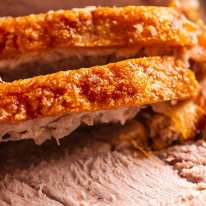 Close up of slices of Pork Roast with Crispy Crackling